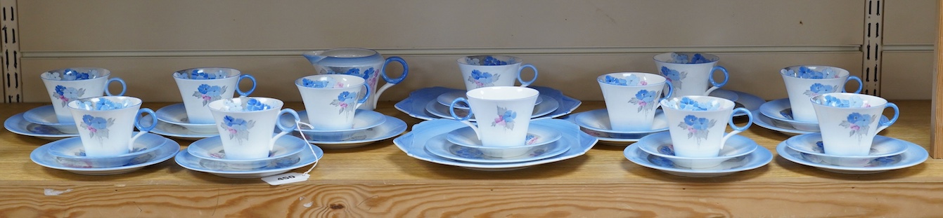 A Shelley twelve place teaset comprising trios, two sandwich plates and milk jug, 24cm high. Condition - mostly fair, some hairlines